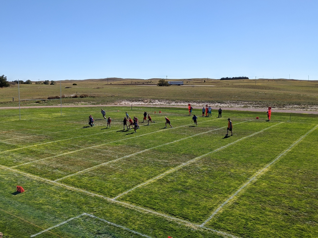 Girls playing football for Powder Puff.